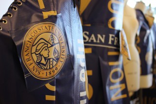 Senior Apparel Design and Merchandising student __  cuts sews reuses SF State plastic street banners to construct universal unisex outfits in Burk Hall room 410, Wed. Mar. 12.  The outfits will be showcased in a SF State fashion show in May. Photo by Tony Santos / Xpress