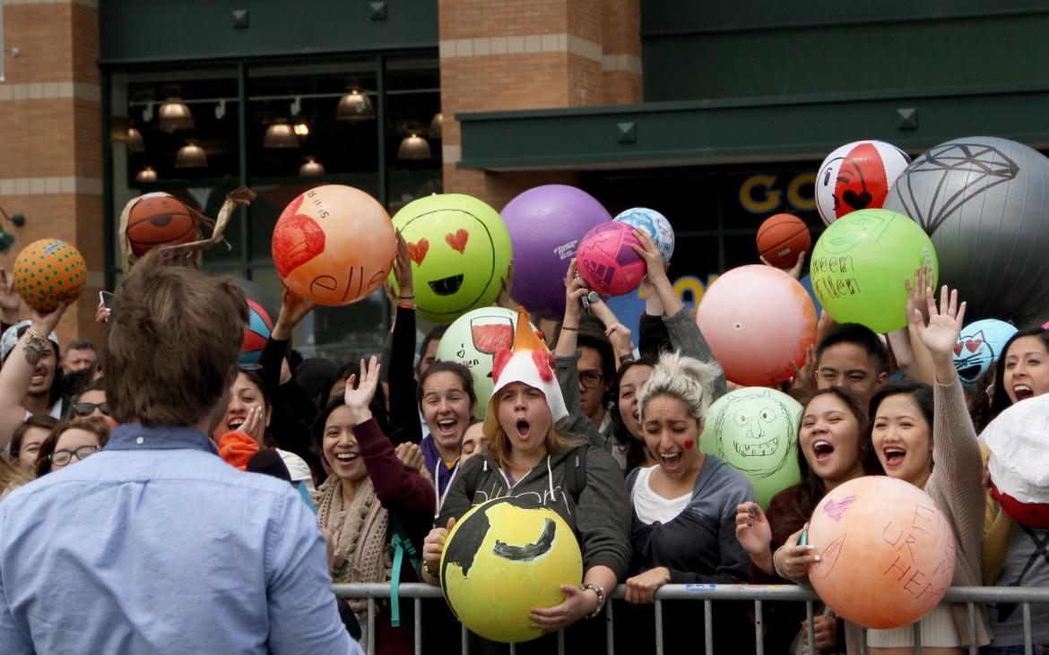 Some SF State students await with their designed Emoji balls to be seen on the Ellen DeGeneres show at Dicks Sporting Goods in Daly City on Monday, May 11. Photo by Angelica Williams/Xpress 2015).