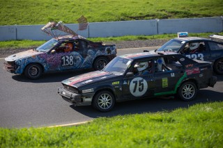 David Burgoon (No. 75 Scuderia Limoni 1988 Alfa Romeo Milano Verde) races in turn 6 at Sonoma Raceway during the 24 Hours of LeMons Sears Pointless, Sunday, Feb. 14, 2016. (Brian Churchwell / Xpress)