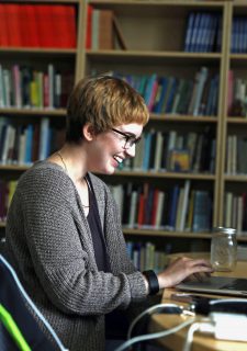 Robyn Ollodort laughs while working at the The Paul K. Longmore Institute on Disability at San Francisco State University on September 8, 2016.