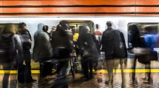 Passengers get on the BART during rush hour at Powell Station on Tuesday, Sept. 13, 2016.