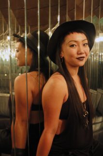 Jolene Linsangan, a party promoter, poses for a portrait in one of the rooms at Club F8 in San Francisco on Friday Nov. 18, 2016. Thi party was put on by Uhaul SF who put on parties for "girls who love girls". (Connor Hunt/Xpress)