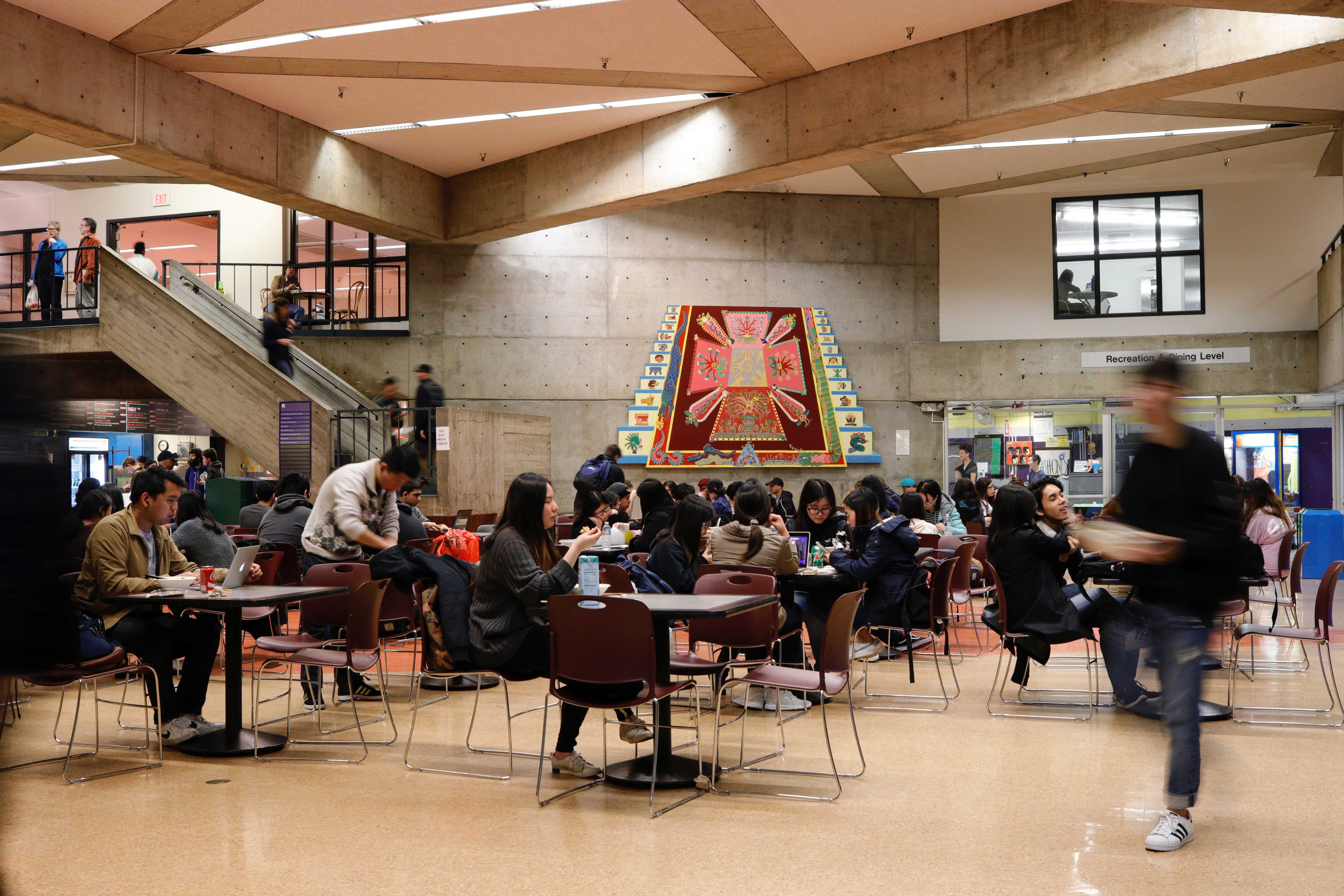 SF State students eat in the bottom floor dining area in the Cesar Chavez Center at SF State on March 2, 2017 in San Francisco, Calif..