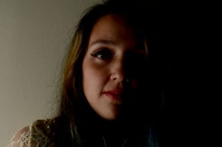 Pamela Ortiz poses at her San Francisco home. Photo by Aaron Levy-Wolins