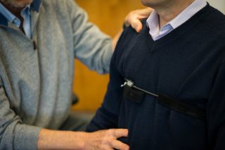 Professors Erik Perper and Richard Harvey demonstrate breathing techniques in the Humanities Building at SF State on Monday, April 17, 2017 (Sarahbeth Maney).