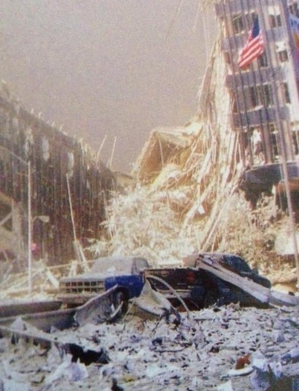 Jimmy+Buckley%E2%80%99s+truck%2C+surrounded+by+debris%2C+stood+in+front+of+the+crumbling+towers+during+theattacks+on+the+World+Trade+Center.+The+truck+was+never+found+following+the+incident.