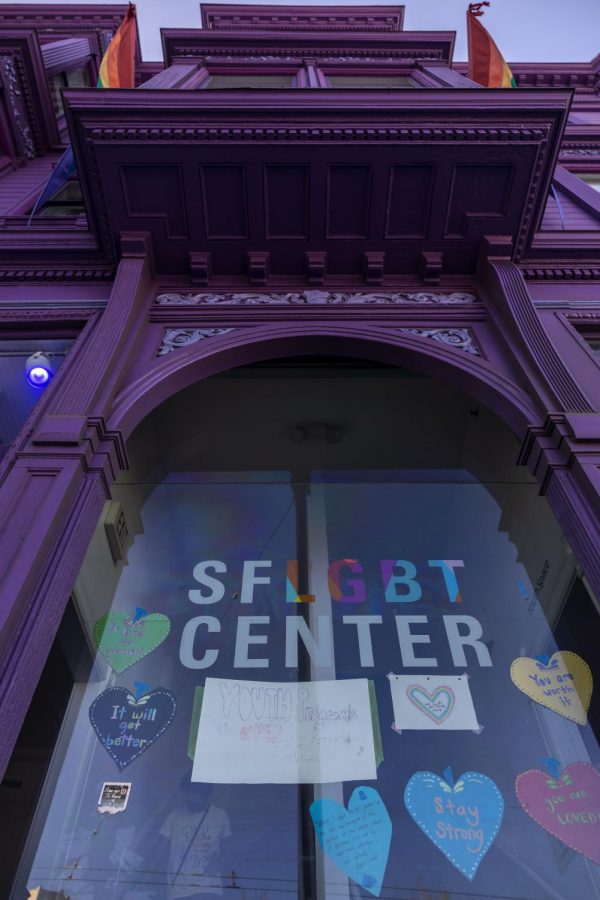 Positive note affirmations are taped on the window of the SFLGBT Center in the Castro District. (Emily Curiel / Xpress Magazine)