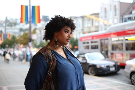 Ziggy Deberry, 20, poses for a photo in the historic Castro neighborhood of San Francisco on Dec. 3, 2021. “There needs to be space — there has to be space — for the people who are now struggling,” they say. (Kenzie Aellig / Xpress Magazine)