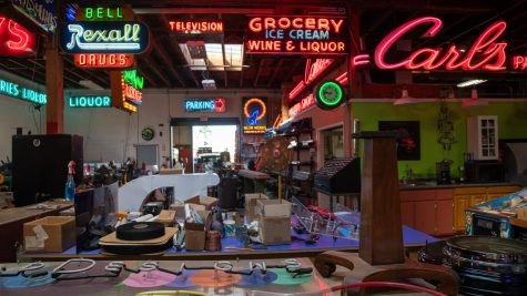 The interior of Neon Works in Oakland on March 10, 2022. The 17,000-square-foot space houses lit up neon signs, along with works in progress, retired signs and all the tools necessary for bending and maintenance. (Morgan Ellis / Xpress Magazine)