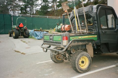 A John Deere utility vehicle sits outside of the groundworks facility on March 29, 2022. The groundsworkers use this to travel around campus early in the morning to conduct their routine maintenance. (Rene Ramirez / Xpress Magazine)