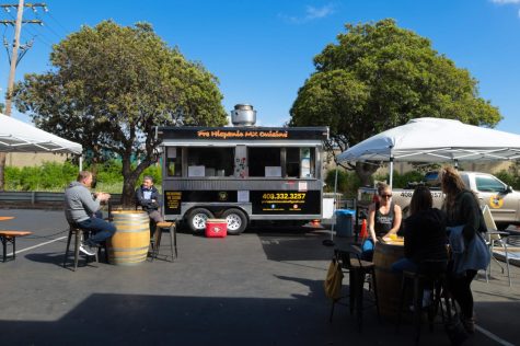 Alpha Acid Brewing Co. has food truck pop-ups every Thursday through Sunday, which allows their customers to grab a bite while they enjoy a beer in Belmont on May 8, 2022. (Bianca Heredia / Xpress Magazine)