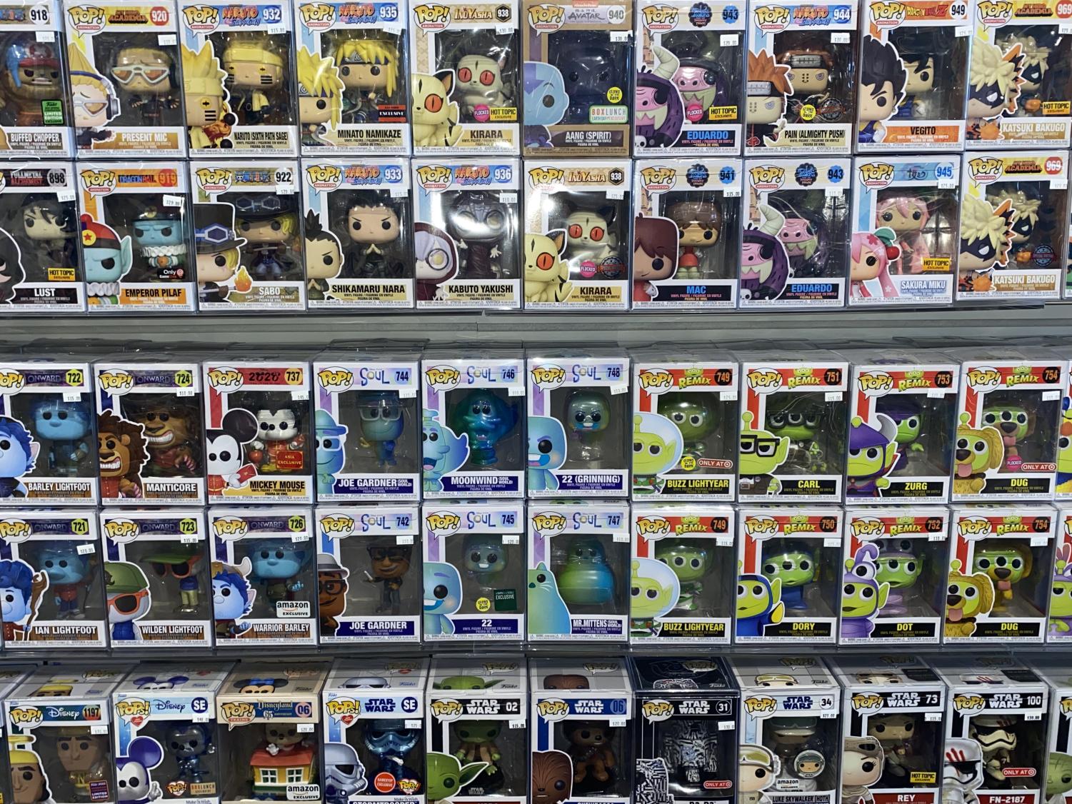 A wall of Funko Pops fill the right side of the Pop Plug’s storefront in Santa Clara, and are all organized by genre on Aug. 31. (Ciara O’Kelley / Xpress Magazine) 