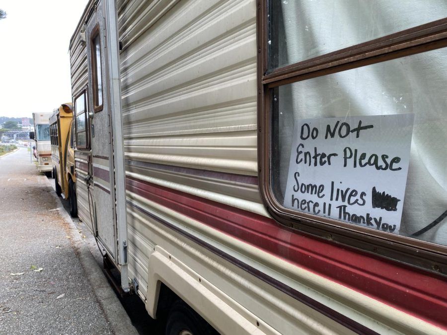 A sign posted in the window of an RV parked along Lake Merced Boulevard. It stands as a reminder to any who may forget someone lives  inside. Residents often deal with break-ins and belongings being stolen, such as generators or other personal effects.(Kamal Taj / Xpress Magazine)
