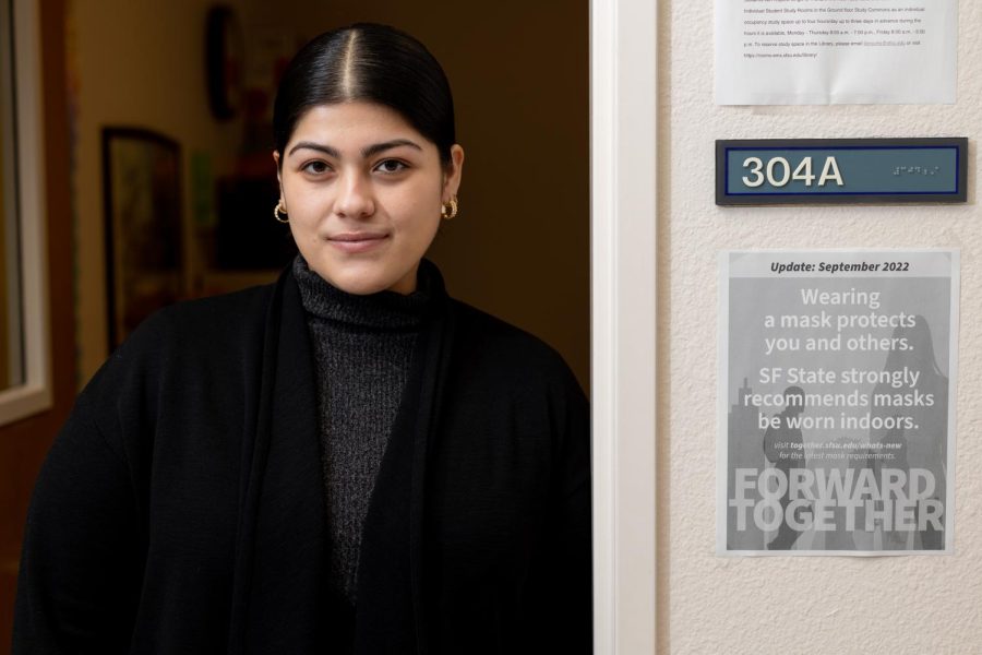 Leila Harara, student administrative assistant and Political Science student getting a masters, stands in their office in the Political Science office at 304a. (Abraham Fuentes / Xpress Magazine)