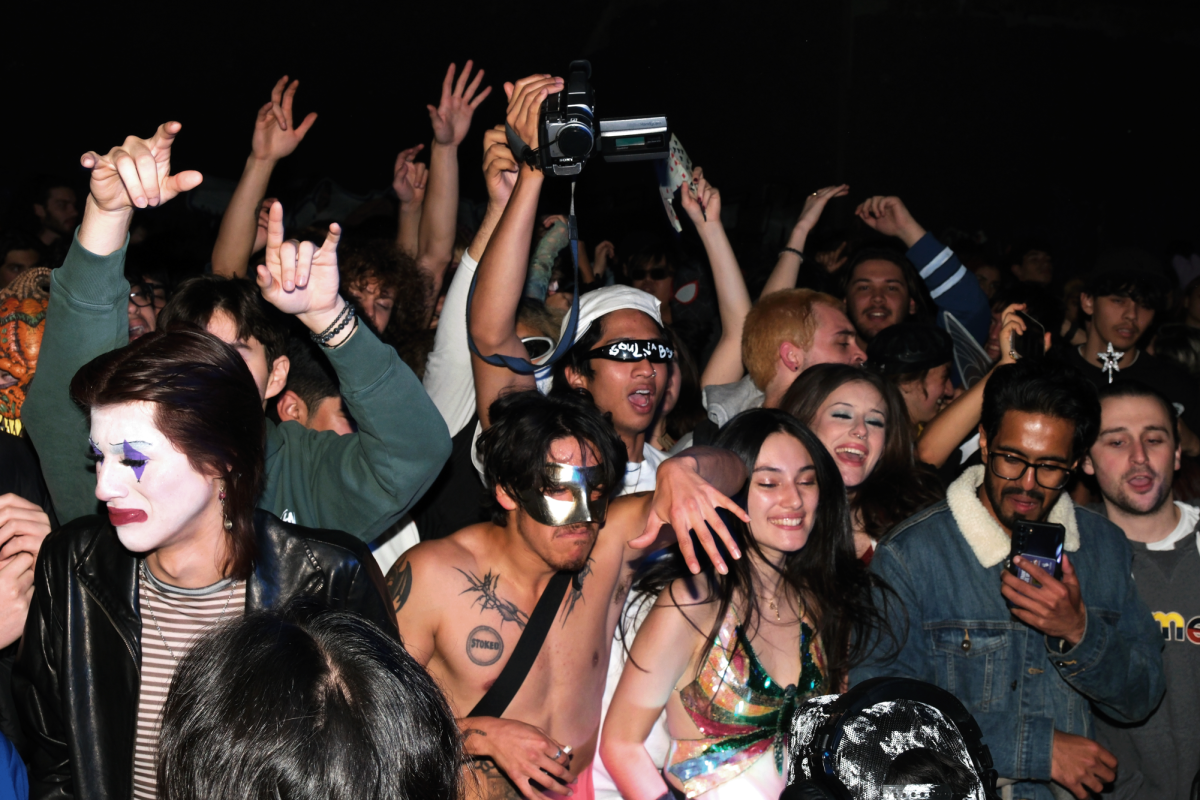 A crowd dances during Tobë set at the cave rave on Saturday, Oct. 28, 2023. (Andrew Fogel/Xpress Magazine)   