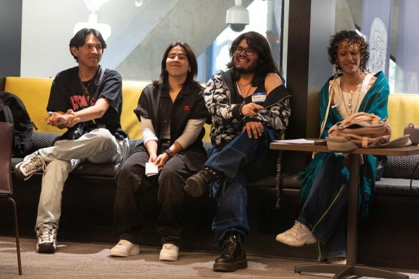 [From left to right] Joseph Escobedo, Mariana Del Toro, Oliver Elias Tinoco and Rogelio Cruz, Latinx Queer Club officers, introduce themselves to members in the meeting room on the second floor of the Cesar Chavez Student Center.