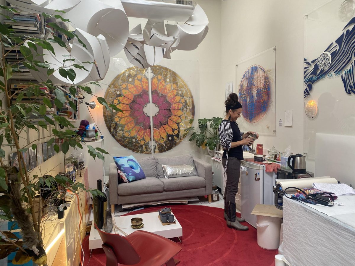 4.6 miles away from Richardson Bay, Raylene Gorum prepares tea in her Sausalito art study. (Asé Mora/ XPress Magazine)