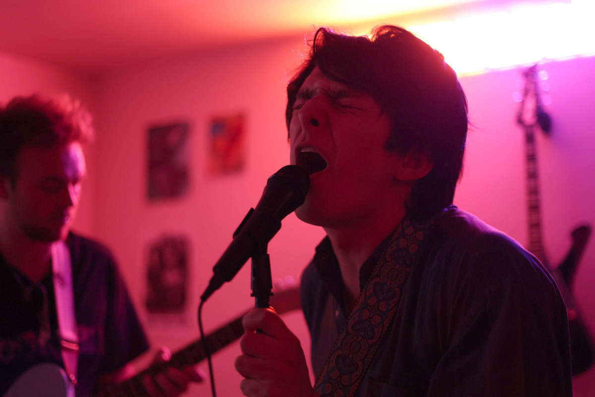 Lead vocalist Louis Addis sings during an Elephant Garden band rehearsal. (Braelyn Furse / Xpress Magazine)