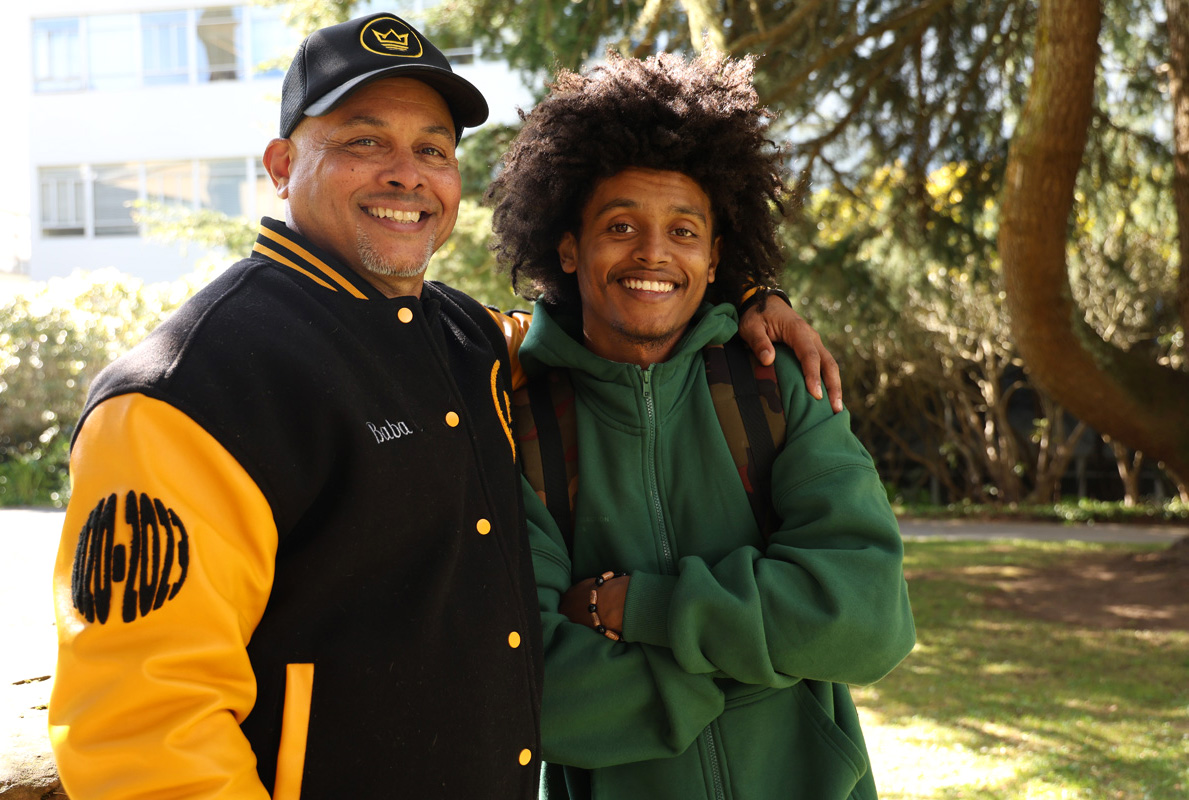 Chris (left) and Jordon (right) Chatmon, father and son, at SF State. Chris’ mother, Deloyce Chatmon (not pictured), was also an alum of SF State. (Braelyn Furse / Xpress Magazine)
