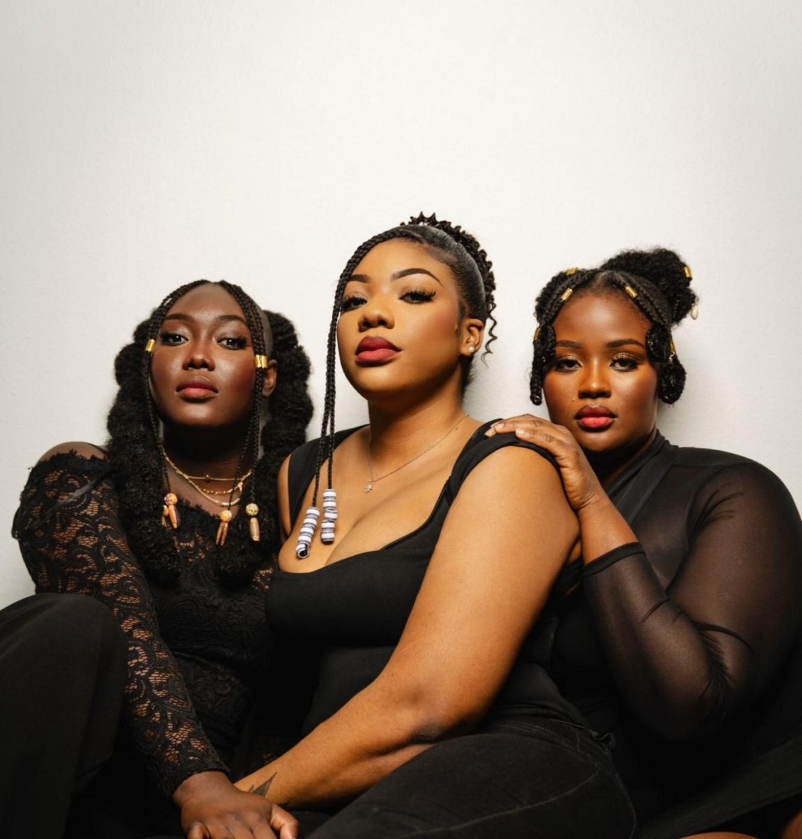Grace Nabolle, Lala Compaore, and Laurel Zonou are co-owners of the West African braiding salon, Menage Lux Beauty, located in Lower Nob Hill. (Photo by Eze Opara) 