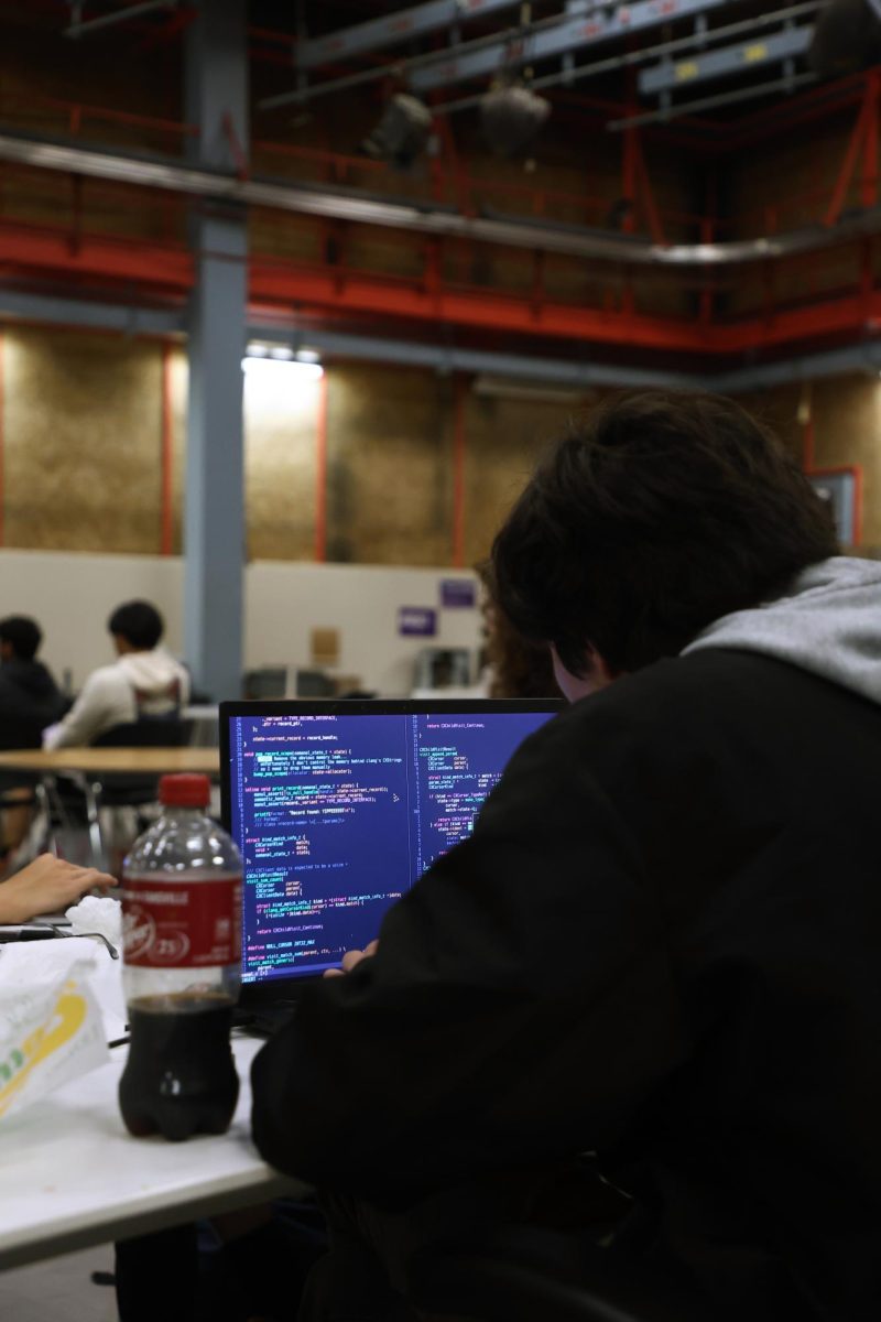 A Game Dev member Aaron works on some coding for “TheAtlasEngine” during a club meeting on Thursday Sept. 25, 2025. (Vanden Harris / Xpress Magazine)