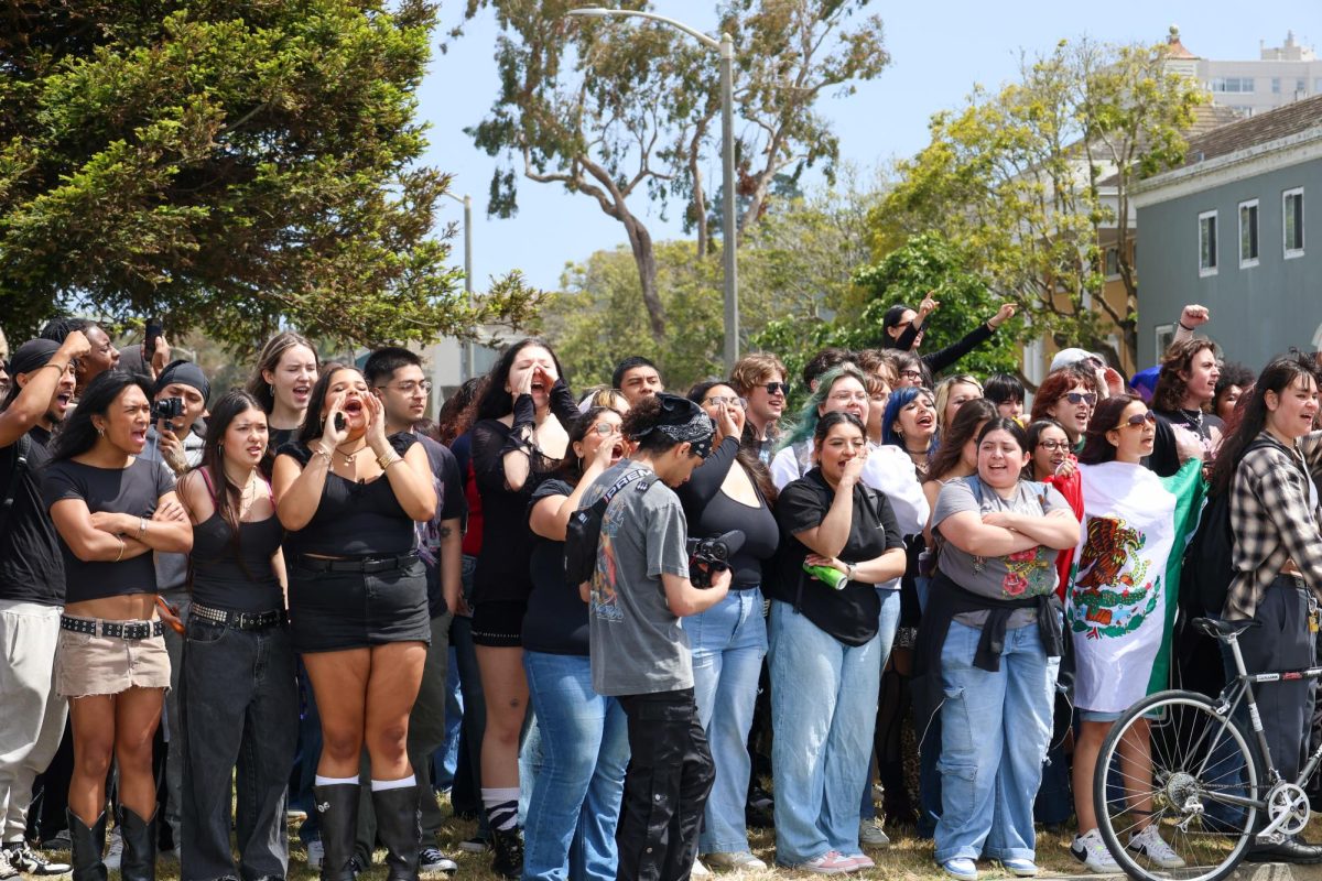 A crowd of protestors gathers outside of Mashouf Field during Charlie Kirk’s “American Comeback Tour” on Tuesday, May 6, 2025. (Haley Abarca / Xpress Magazine)