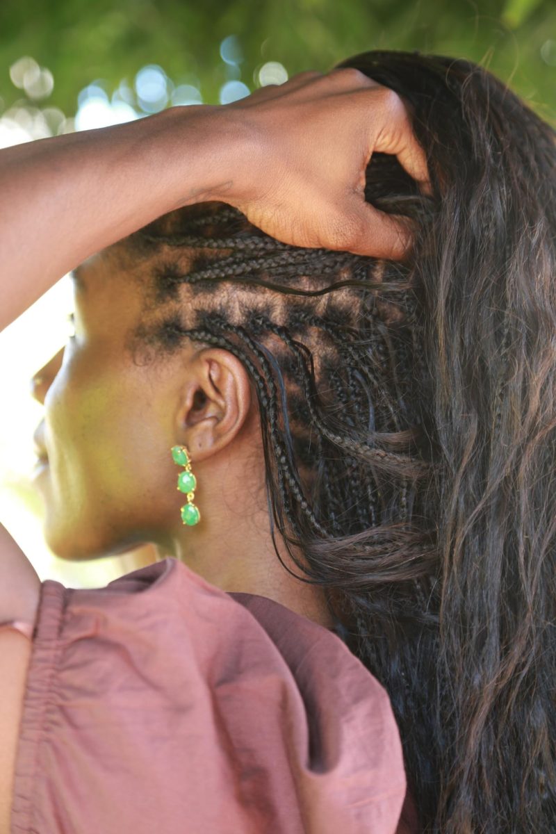Naeemah Charles reveals her Boho Braids, recently done by All Styles Braiding Salon in the Mission District. (Hannah Clark-Nixon / Xpress Magazine)