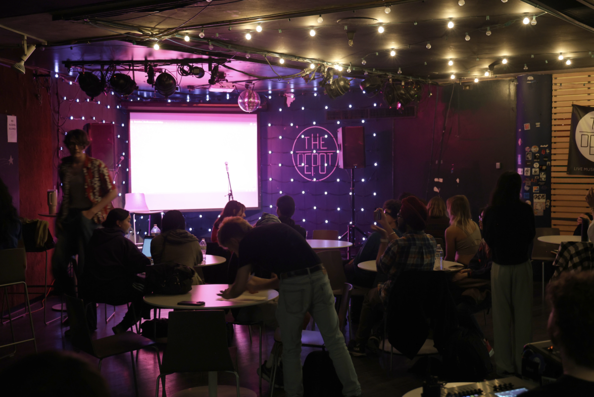 A crowd gathers for the first karaoke night of the fall semester at The Depot. (Haley Abarca / Xpress Magazine)