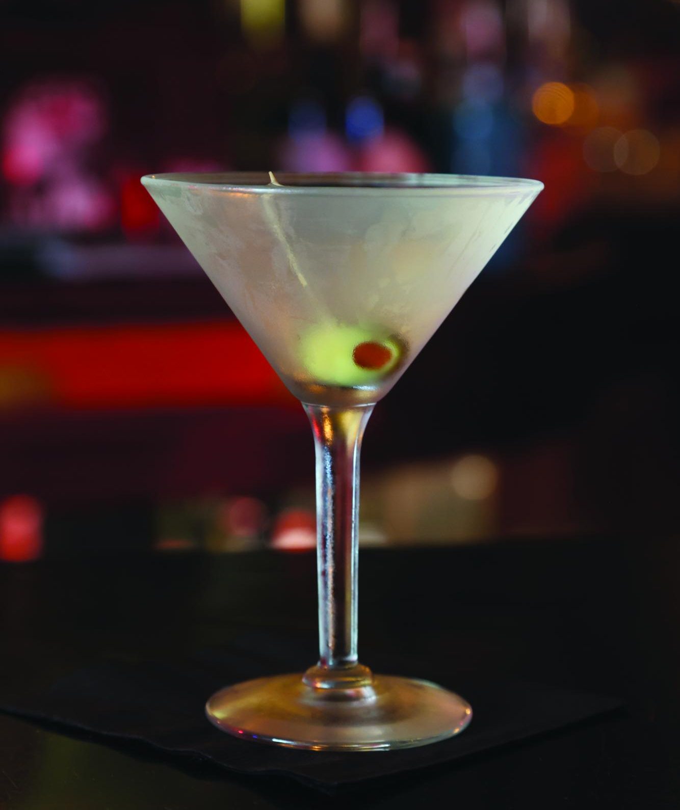 Zam Zam’s classic martini sitting in a chilled glass. The cocktail bar, located on Haight Street in San Francisco, opened in 1941. (Gwen Murray / Xpress Magazine)