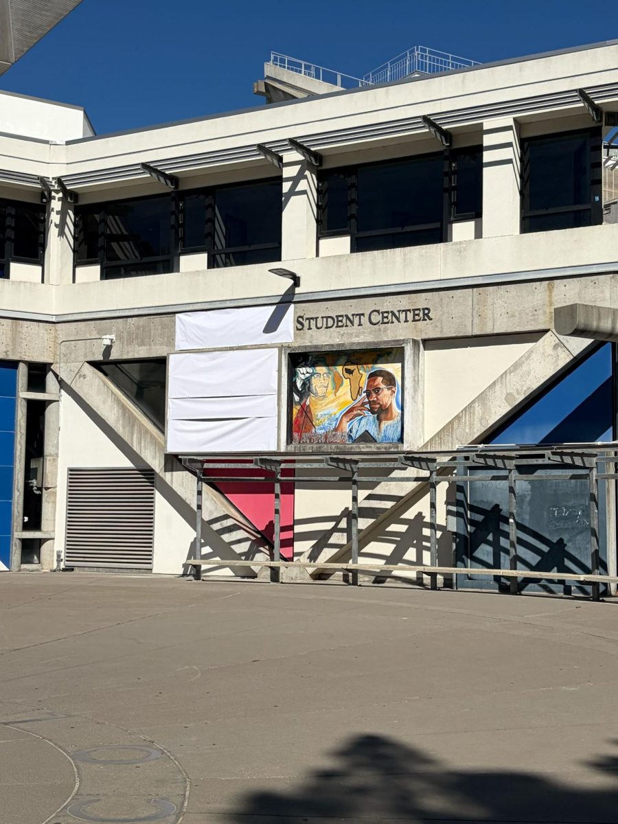 SF State has covered the mural depicting the now disgraced Cesar Chavez and The United Farm Workers Aztec eagle symbol. His name has also been covered on the Student Center building due to activist Dolores Huerta’s recent statement on Chavez’s abuse. (Lara Magdesian / Xpress Magazine)